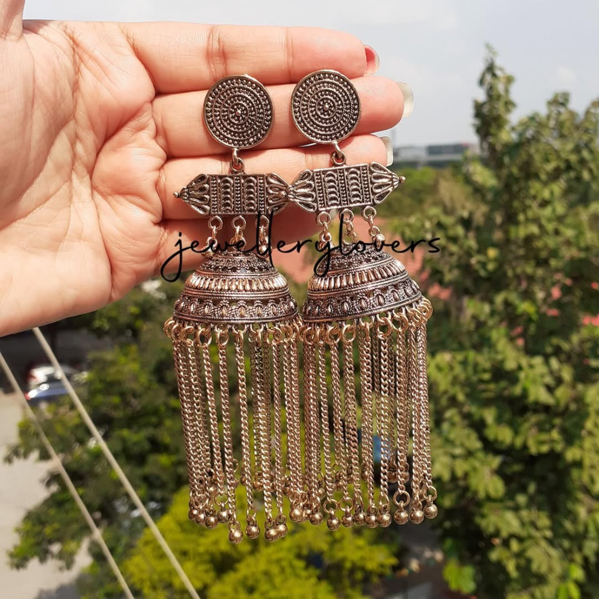 Shop golden long jhumki at Jewellery Lovers. Anti-tarnish, trendy & perfect for daily or festive wear. Free shipping available. jewellerylovers