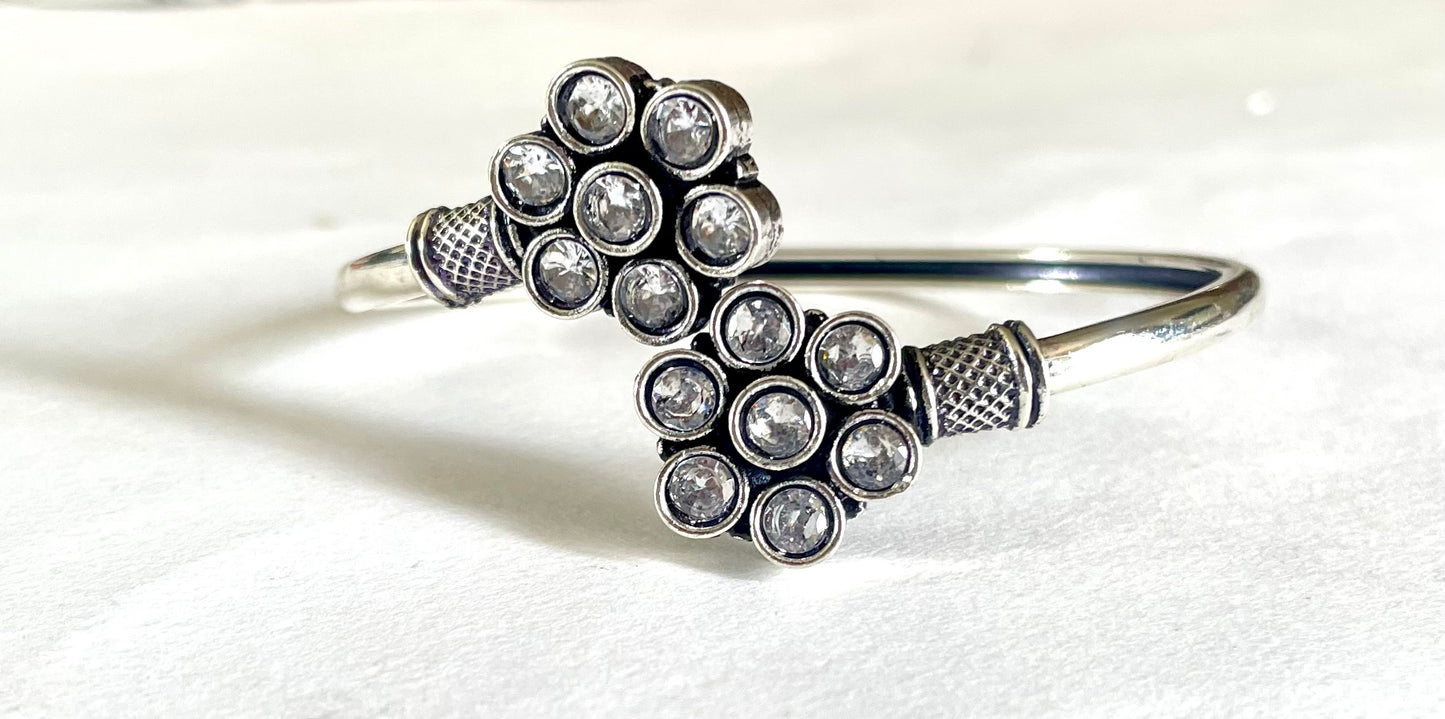 Flower twisted bangle
