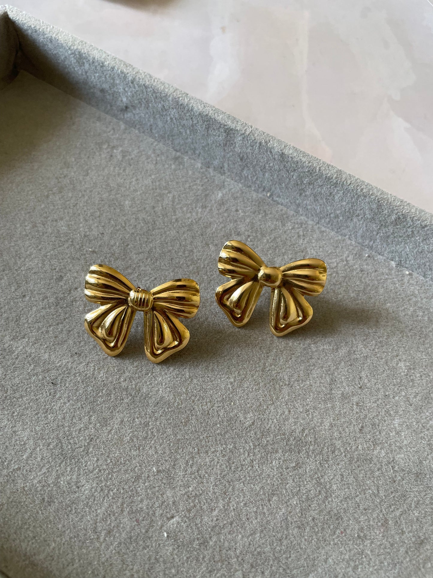 Shop bow earrings at Jewellery Lovers. Anti-tarnish, trendy & perfect for daily or festive wear. Free shipping available. jewellerylovers