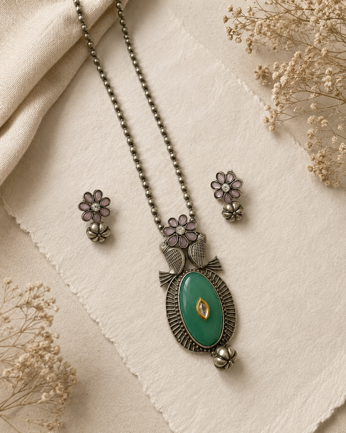 Silver dual tone pendent with earrings jewellerylovers