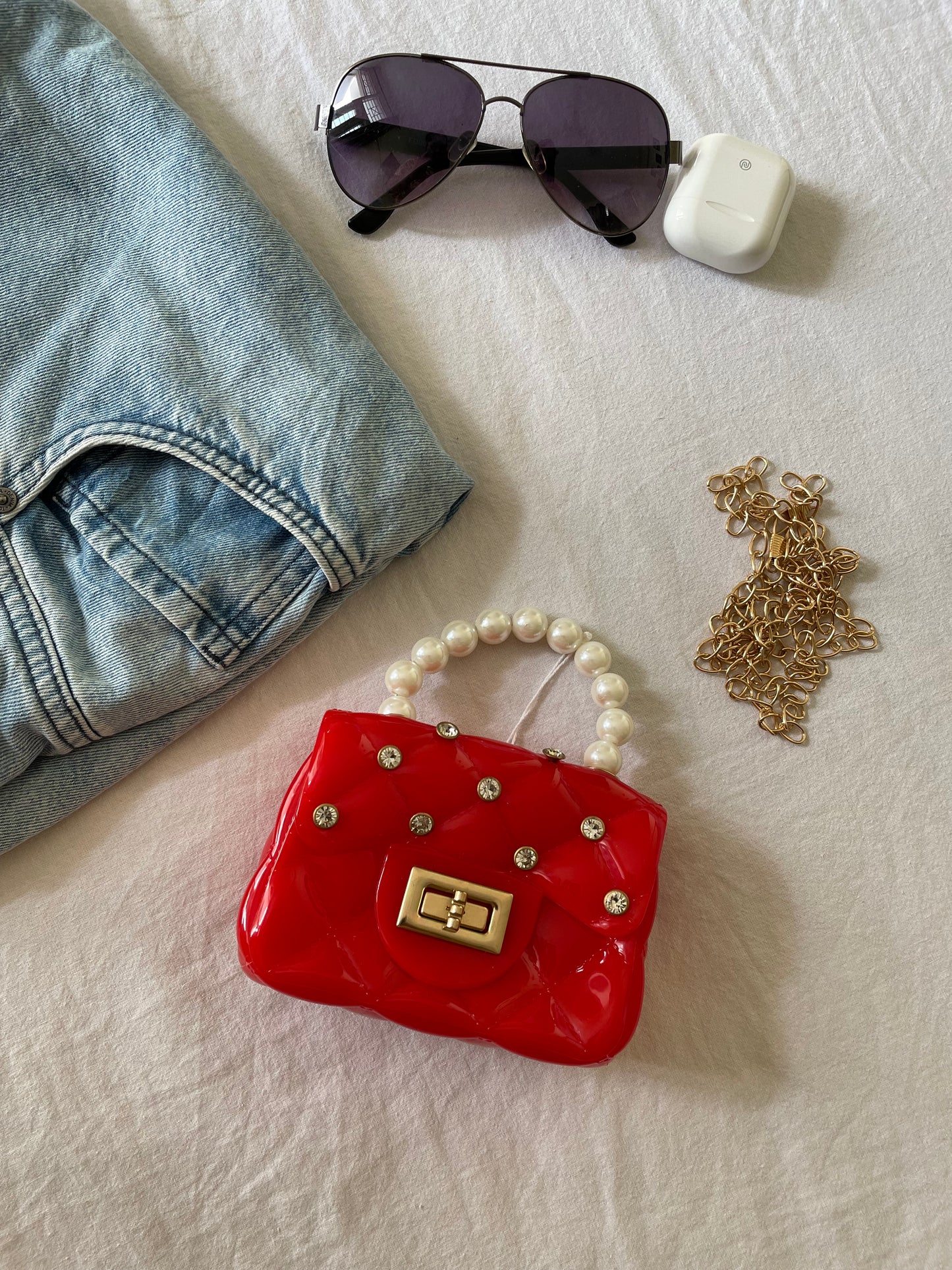 Dotted mini sling bag