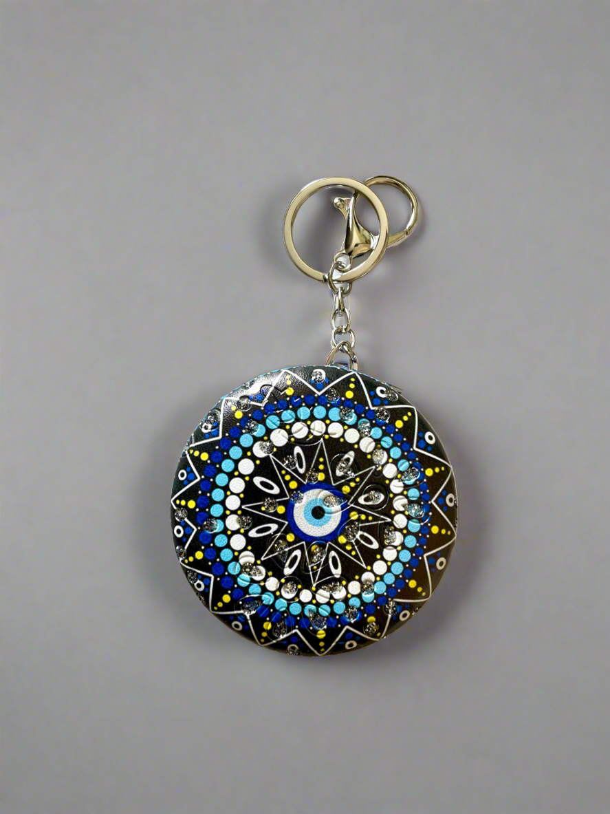 Shop evil eye round mirror keychain at Jewellery Lovers. Anti-tarnish, trendy & perfect for daily or festive wear. Free shipping available. jewellerylovers