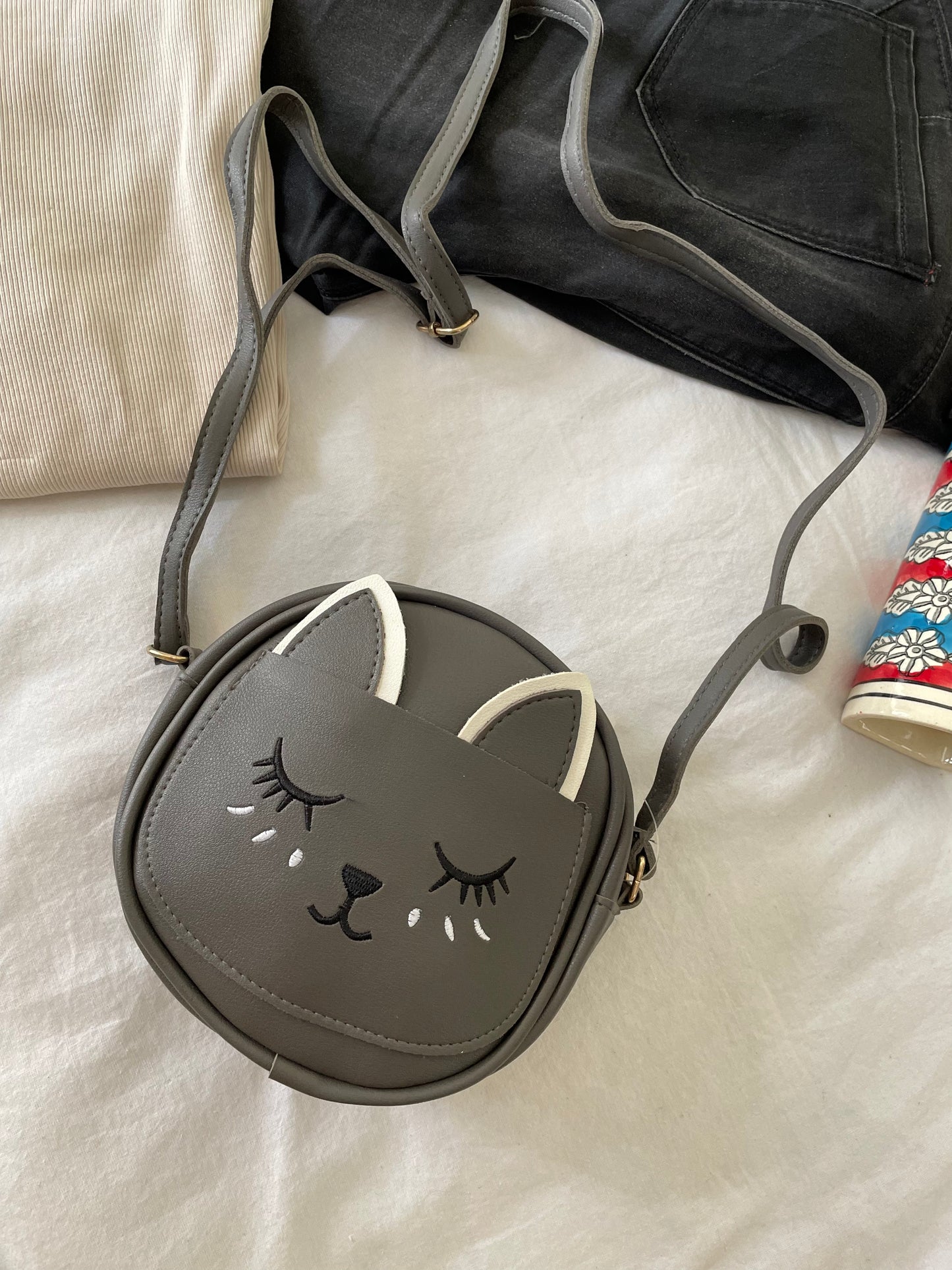 Kitty sling bags