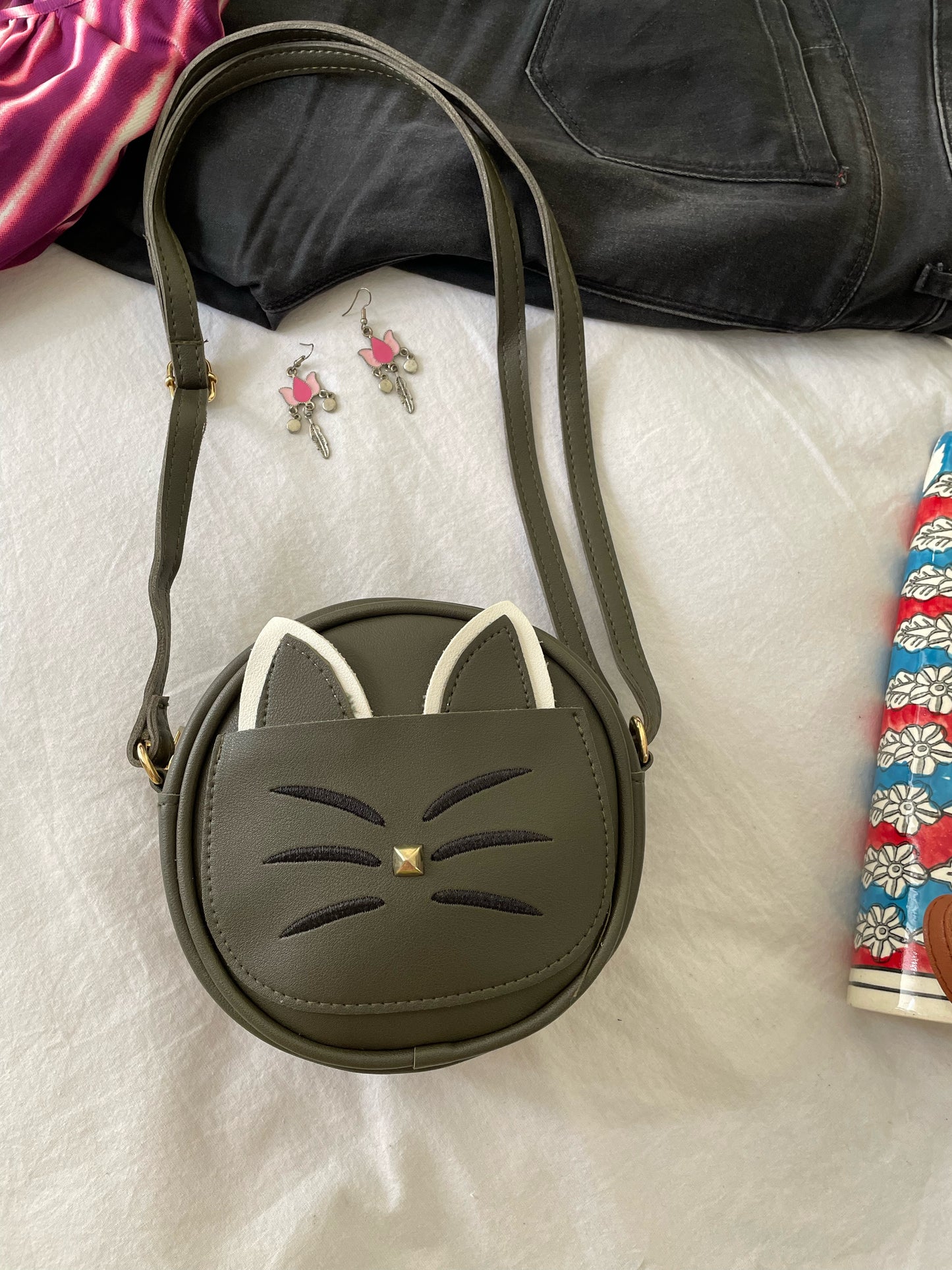 Kitty sling bags