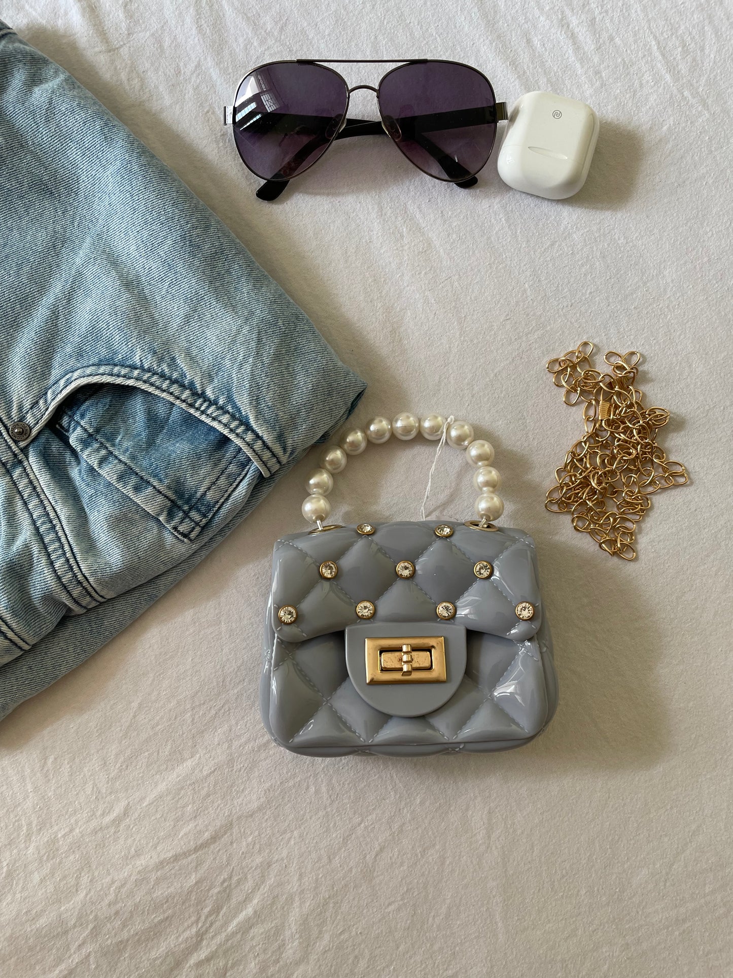 Dotted mini sling bag