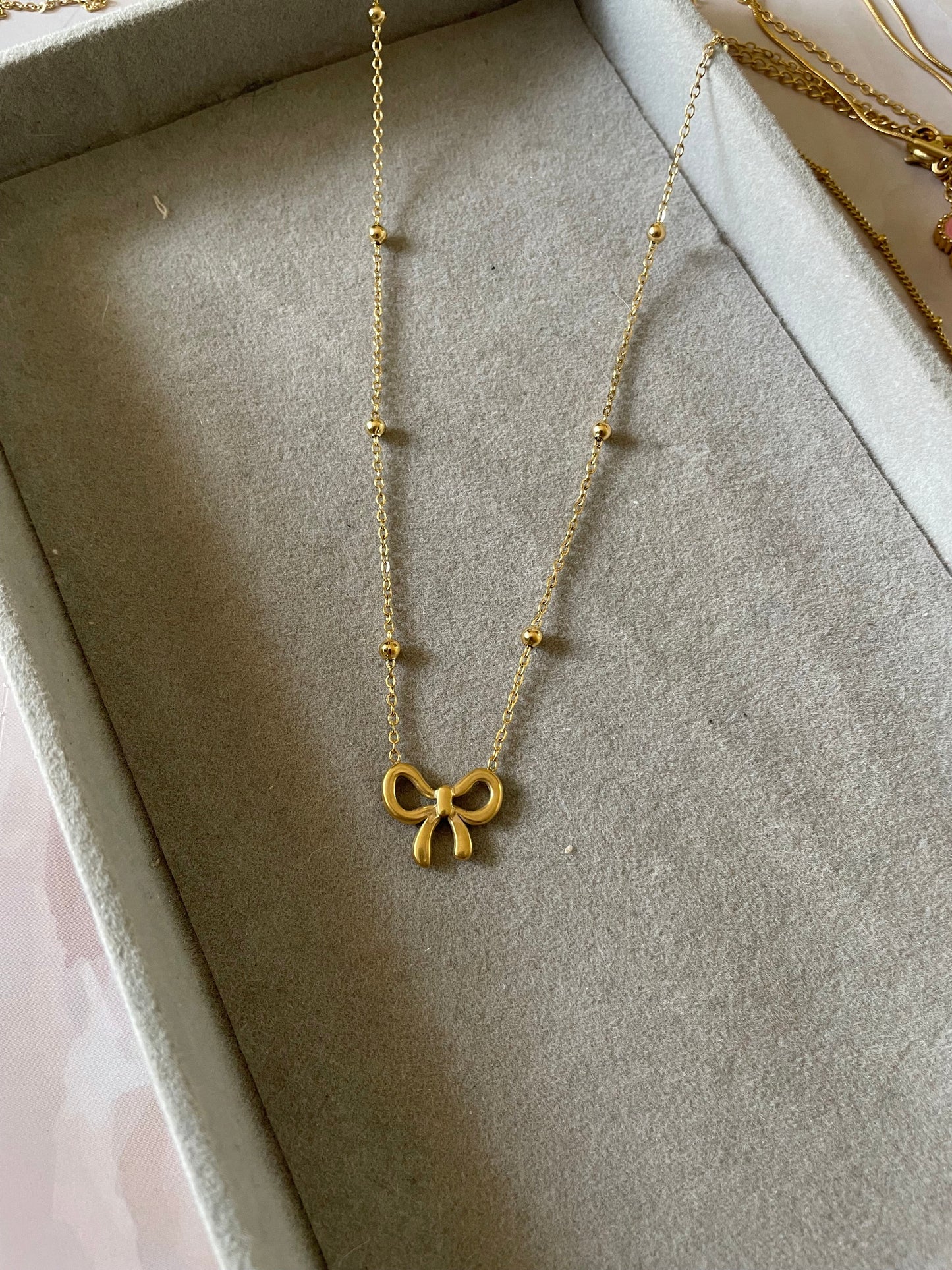 Shop mini bow necklace at Jewellery Lovers. Anti-tarnish, trendy & perfect for daily or festive wear. Free shipping available. jewellerylovers