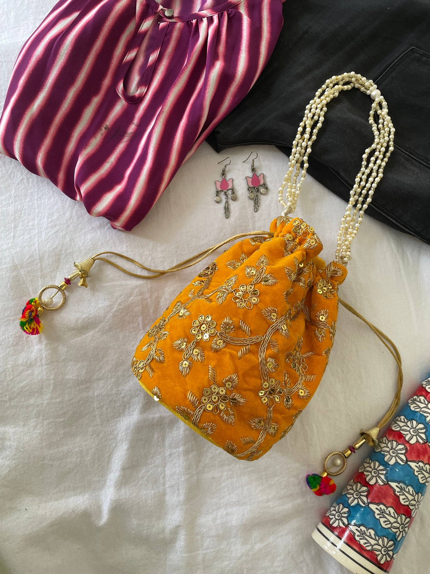 Shop potli at Jewellery Lovers. Anti-tarnish, trendy & perfect for daily or festive wear. Free shipping available. jewellerylovers