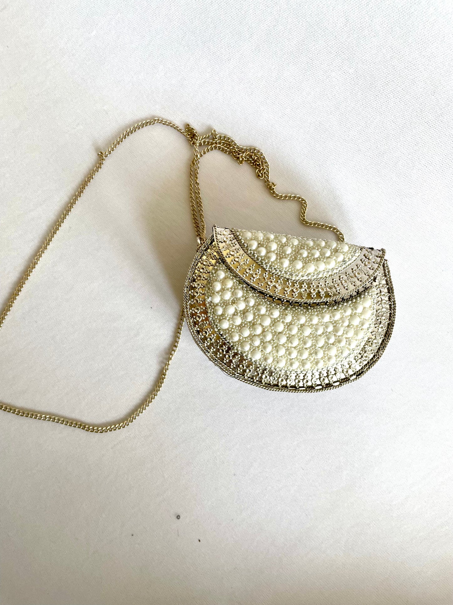 White beaded sling bag