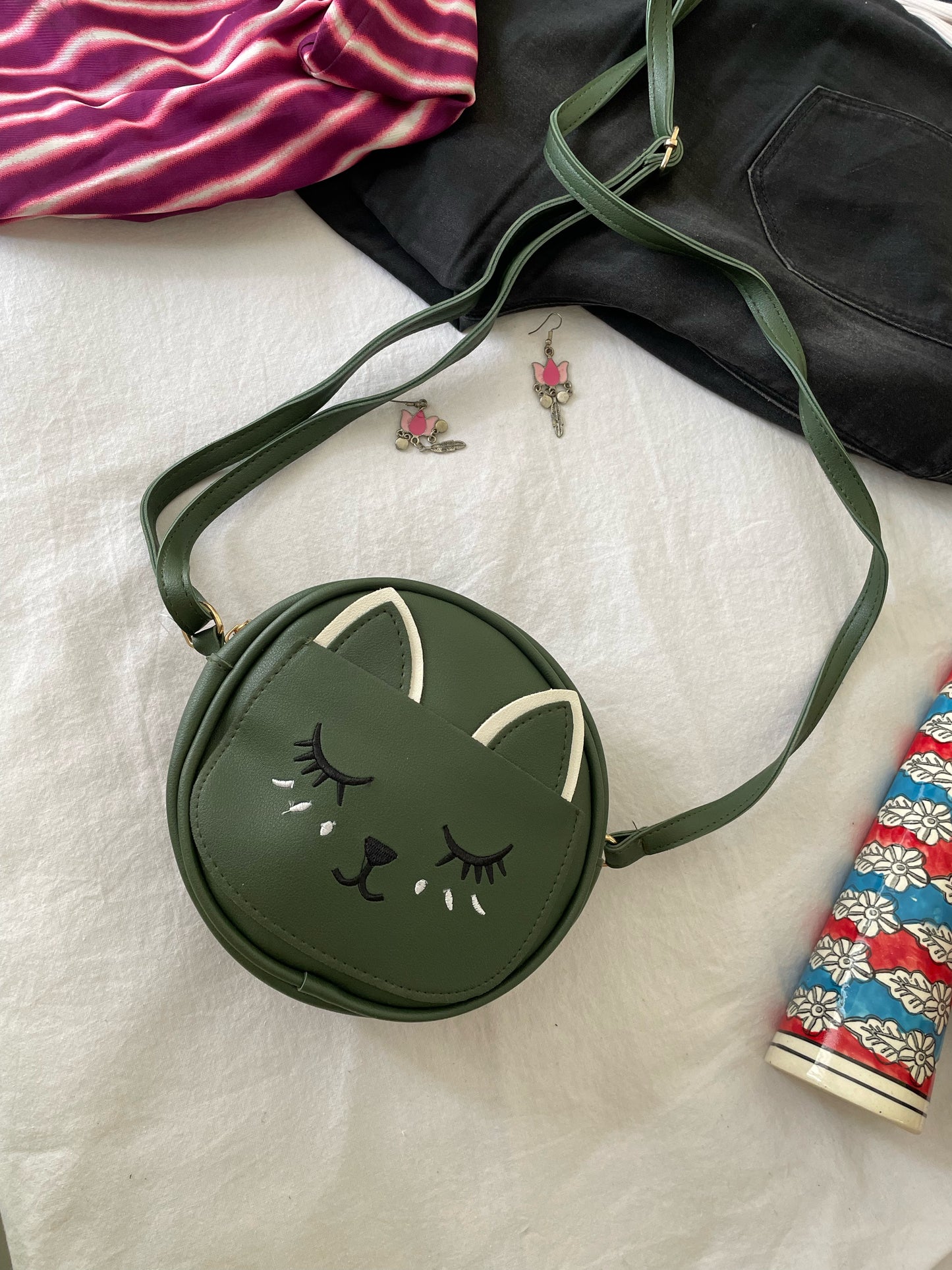 Kitty sling bags