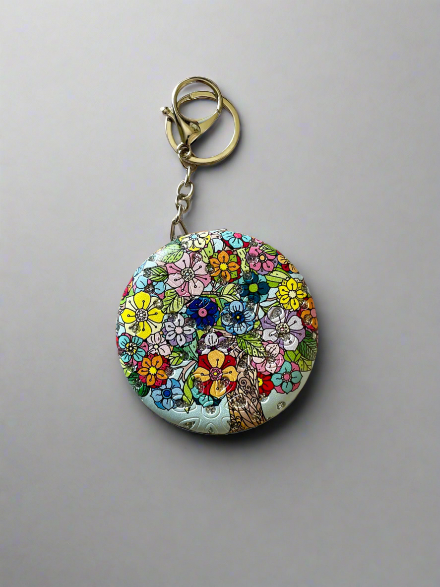 Shop flower mirror keychain at Jewellery Lovers. Anti-tarnish, trendy & perfect for daily or festive wear. Free shipping available. jewellerylovers