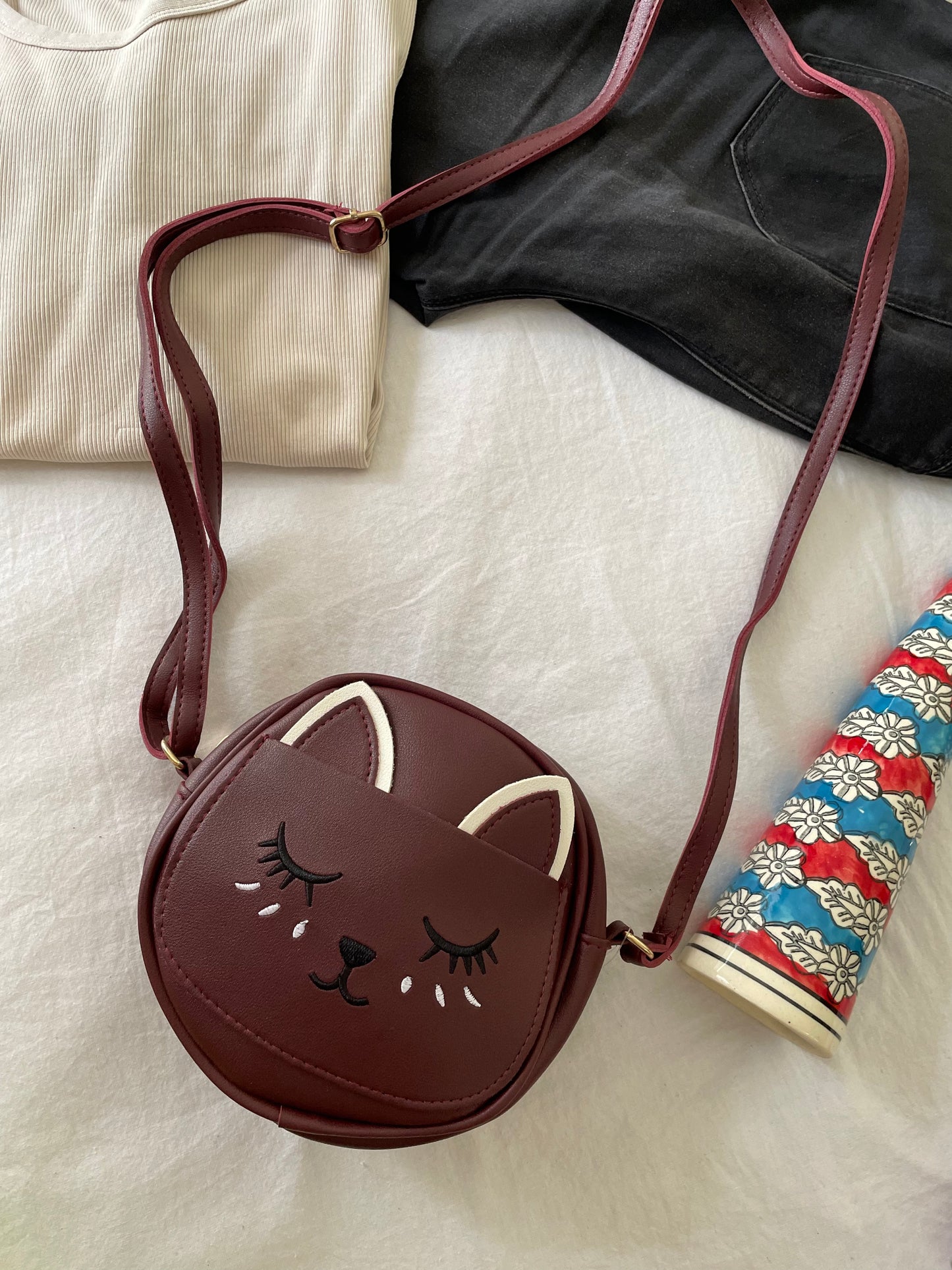 Kitty sling bags