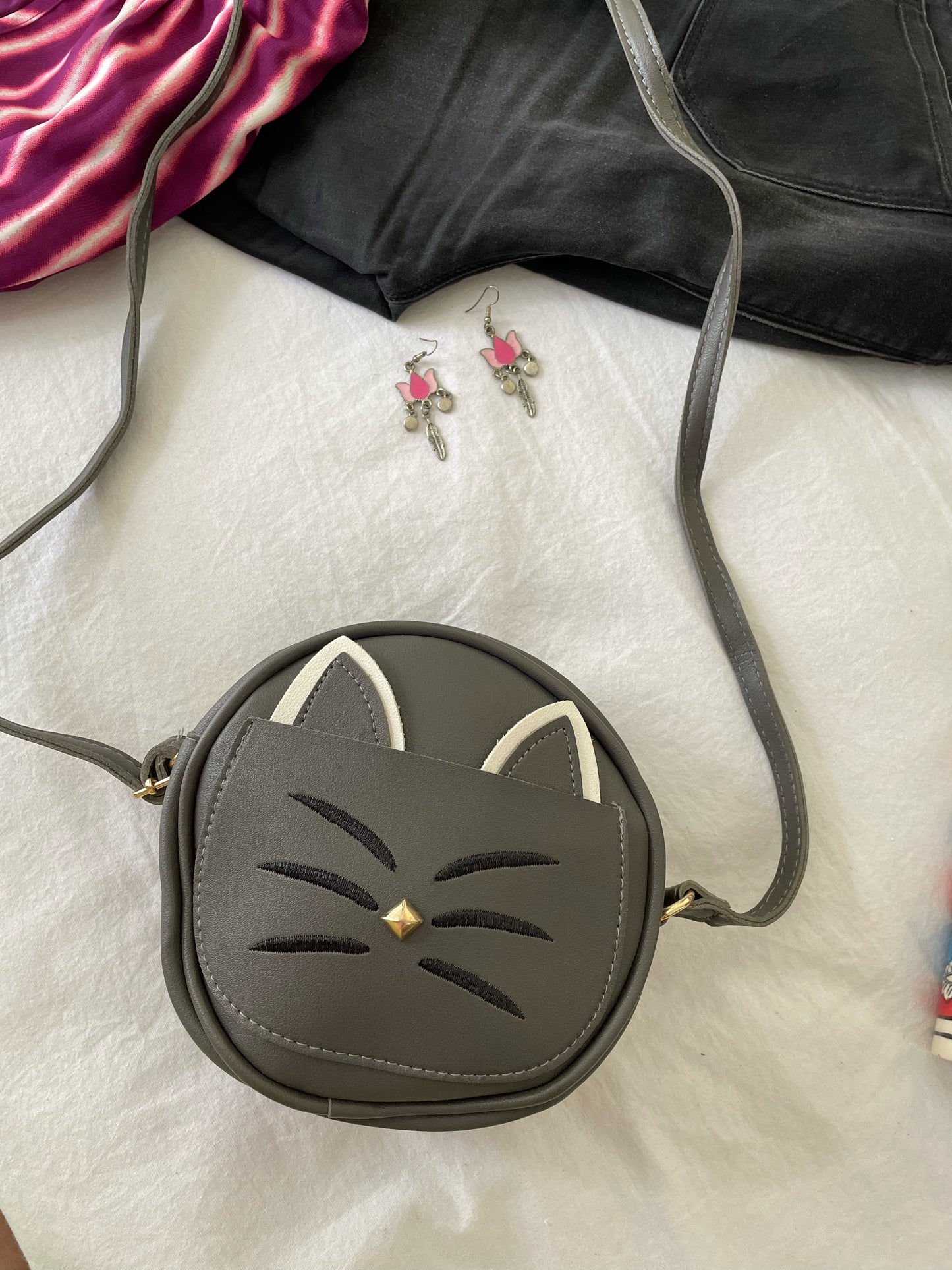 Kitty sling bags