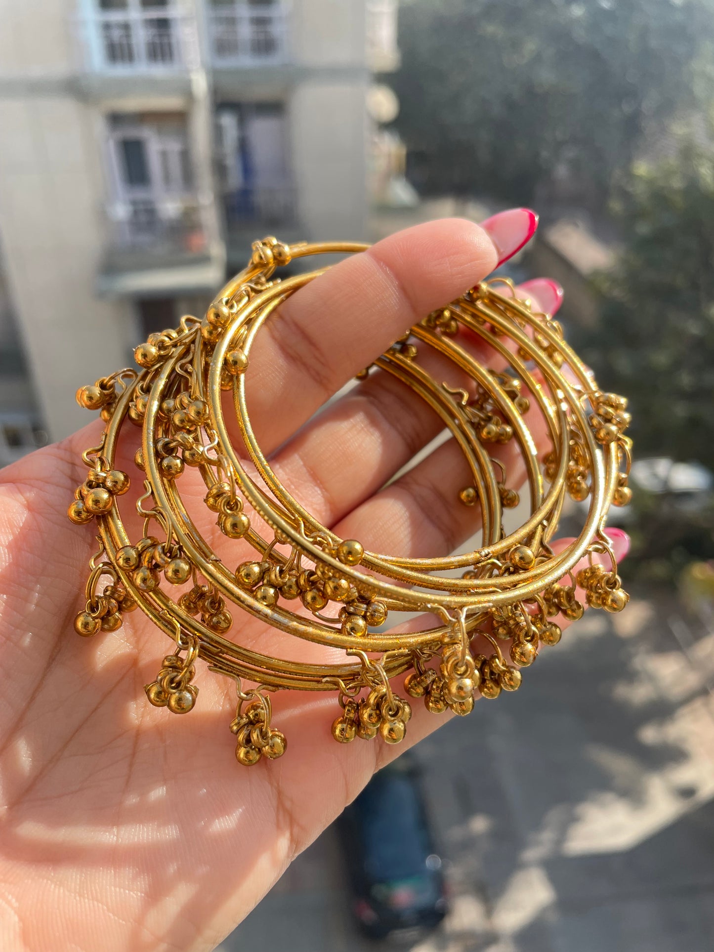 Golden thin ghungroo bangles