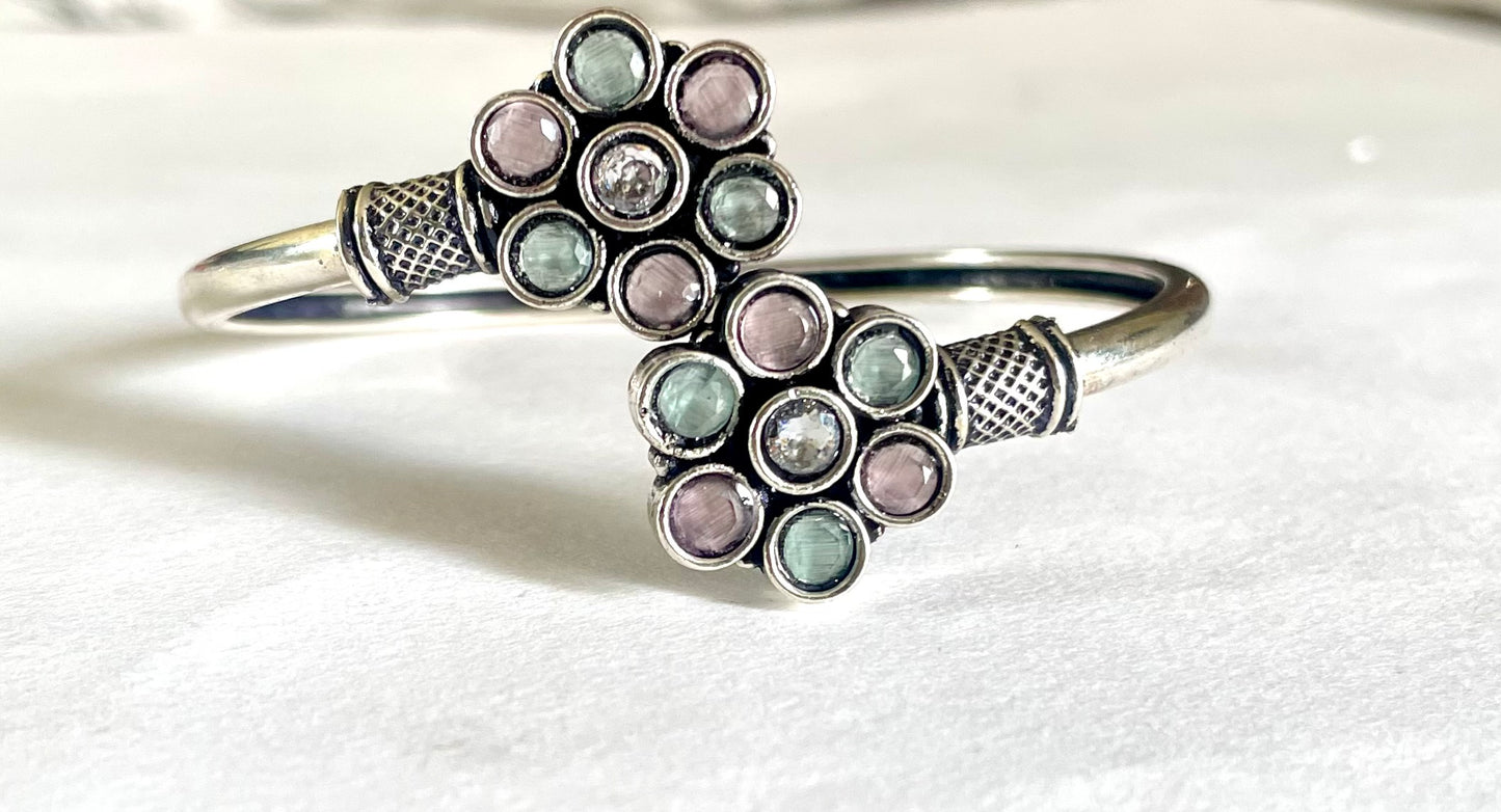 Flower twisted bangle