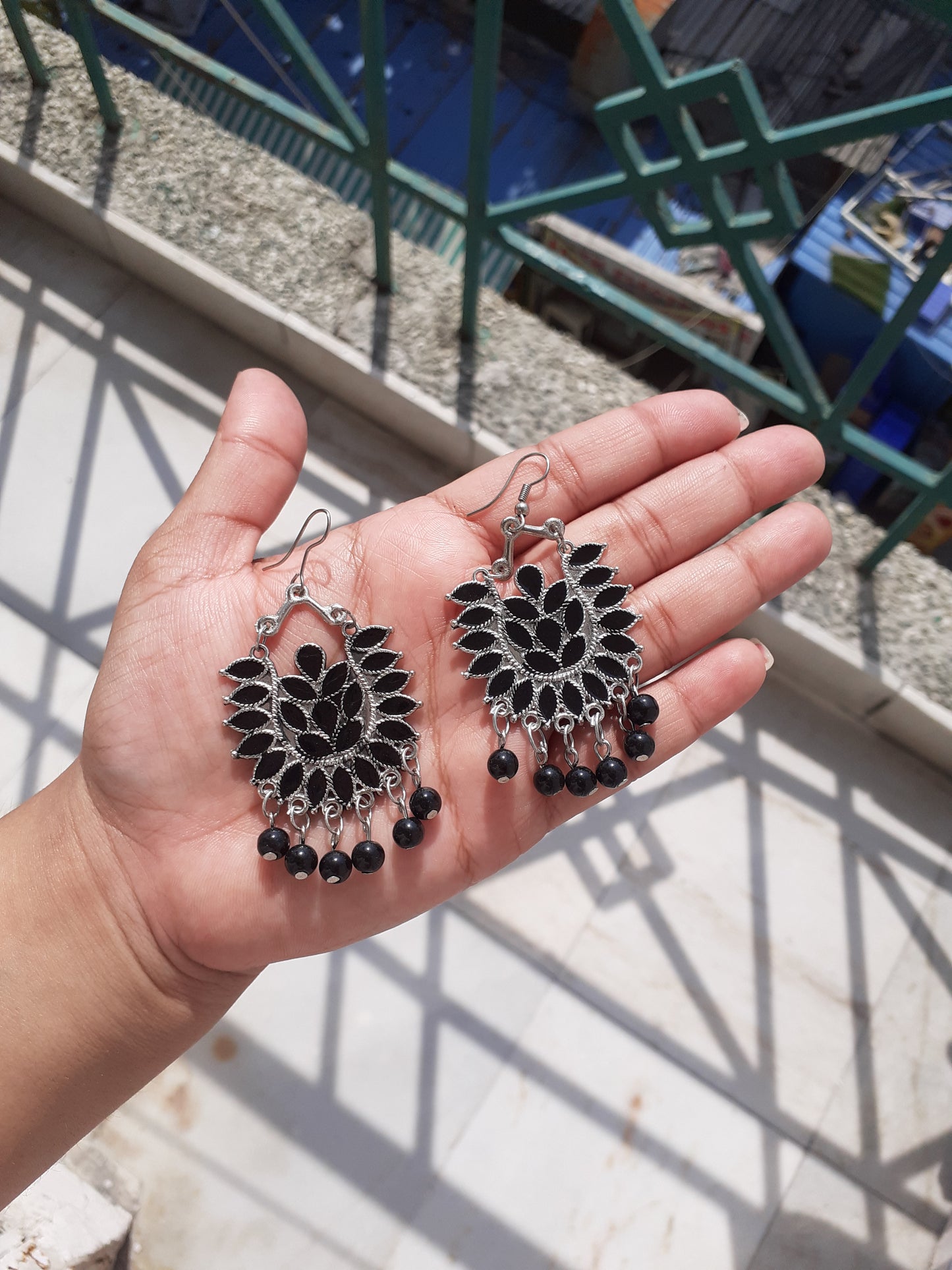 Black beaded hanging earrings