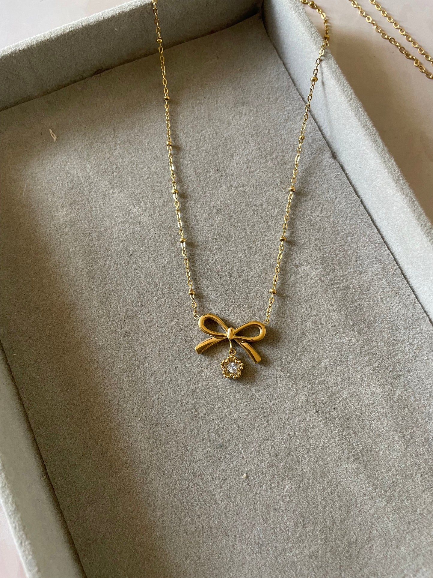 Shop bow necklace at Jewellery Lovers. Anti-tarnish, trendy & perfect for daily or festive wear. Free shipping available. jewellerylovers