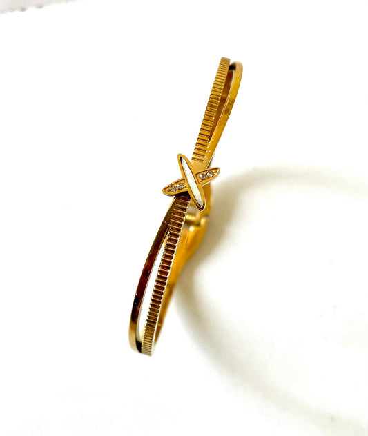 Shop sleek cross bangle at Jewellery Lovers. Anti-tarnish, trendy & perfect for daily or festive wear. Free shipping available. jewellerylovers