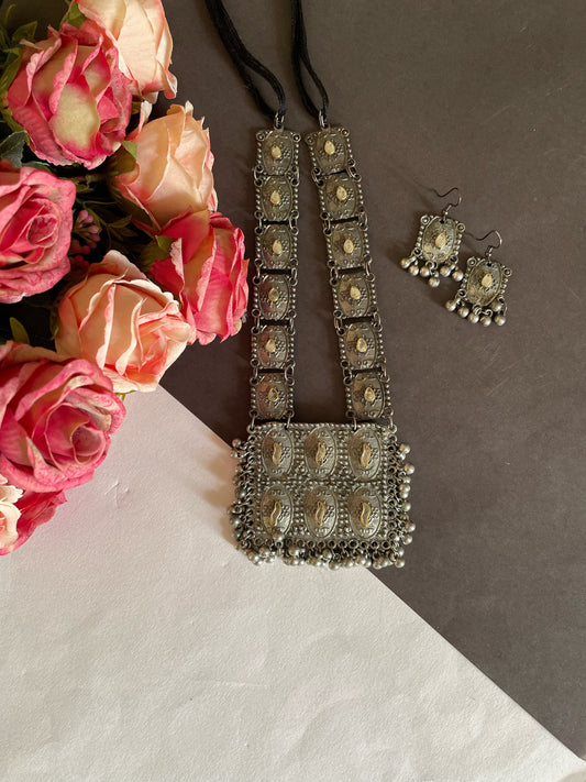 Shop dual tone stone studded pendent with hanging earrings at Jewellery Lovers. Anti-tarnish, trendy & perfect for daily or festive wear. Free shipping availabl jewellerylovers