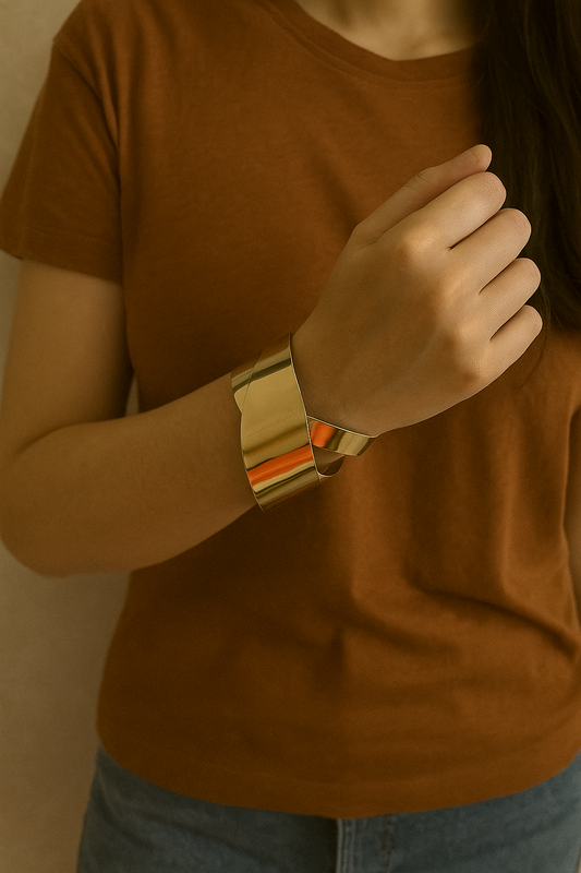 Shop glossy twist cuff bangle - golden finish at Jewellery Lovers. Anti-tarnish, trendy & perfect for daily or festive wear. Free shipping available. jewellerylovers