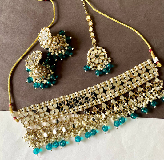 Shop mirror choker set with earrings and maangteeka at Jewellery Lovers. Anti-tarnish, trendy & perfect for daily or festive wear. Free shipping available. jewellerylovers