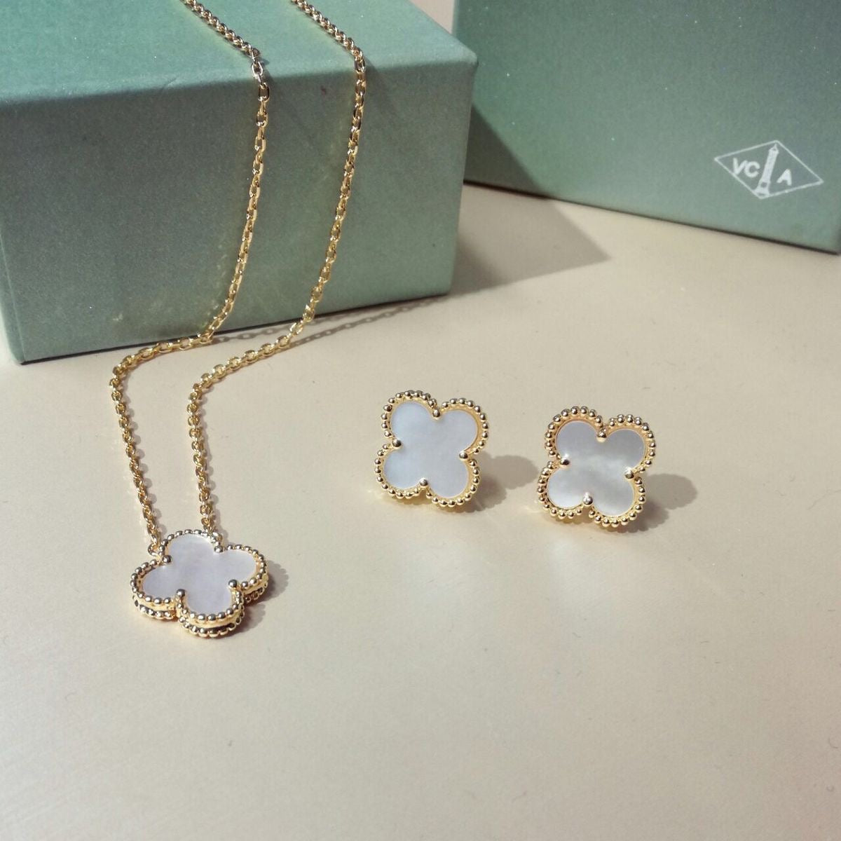 Shop clover charm necklace & earrings set - available in 4 stunning colors at Jewellery Lovers. Anti-tarnish, trendy & perfect for daily or festive wear. Free s jewellerylovers