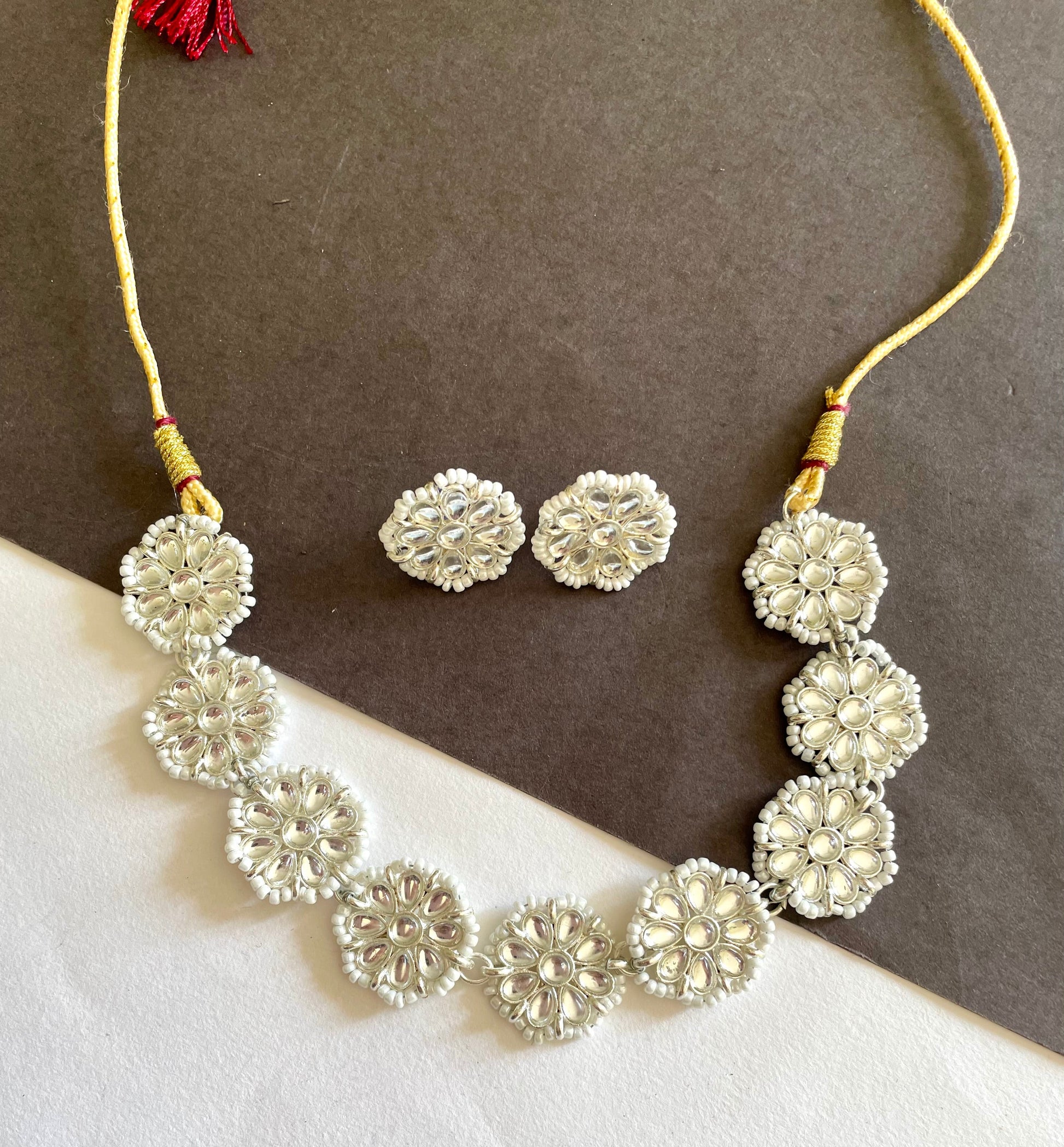 Shop flower white choker with studs at Jewellery Lovers. Anti-tarnish, trendy & perfect for daily or festive wear. Free shipping available. jewellerylovers