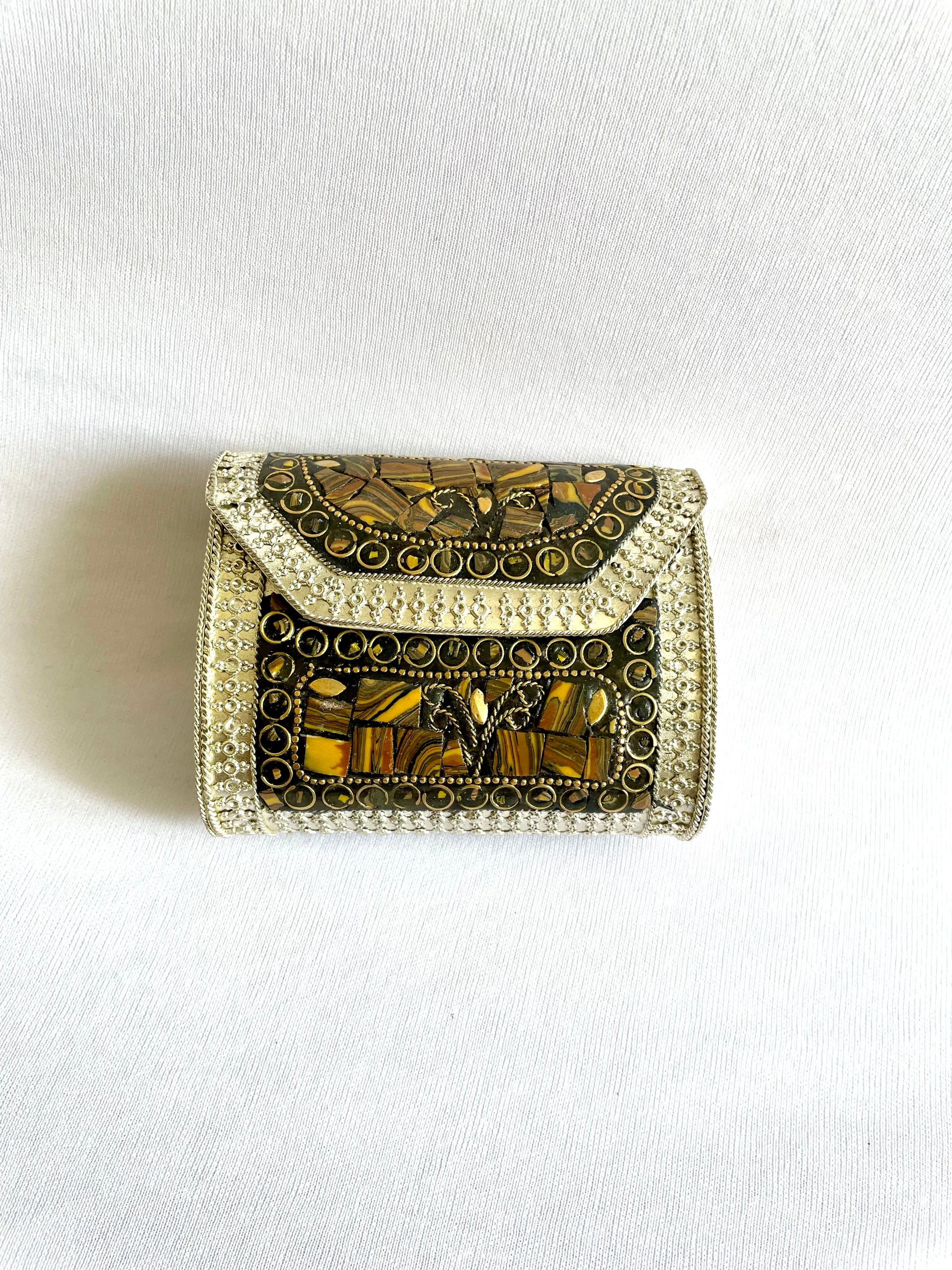 Shop brown brass sling bag at Jewellery Lovers. Anti-tarnish, trendy & perfect for daily or festive wear. Free shipping available. jewellerylovers
