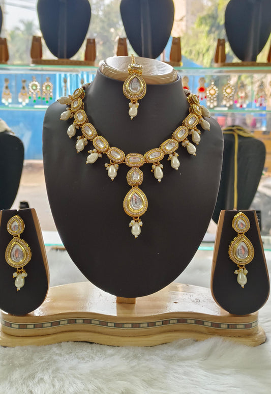 White kundan set