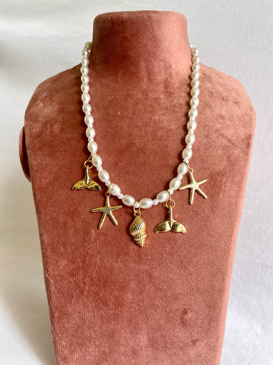 White and gold charms necklace