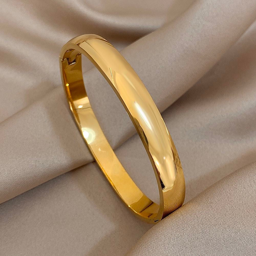 Golden broad plain bangle jewellerylovers