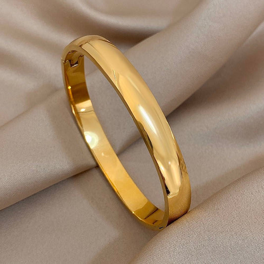 Golden broad plain bangle jewellerylovers