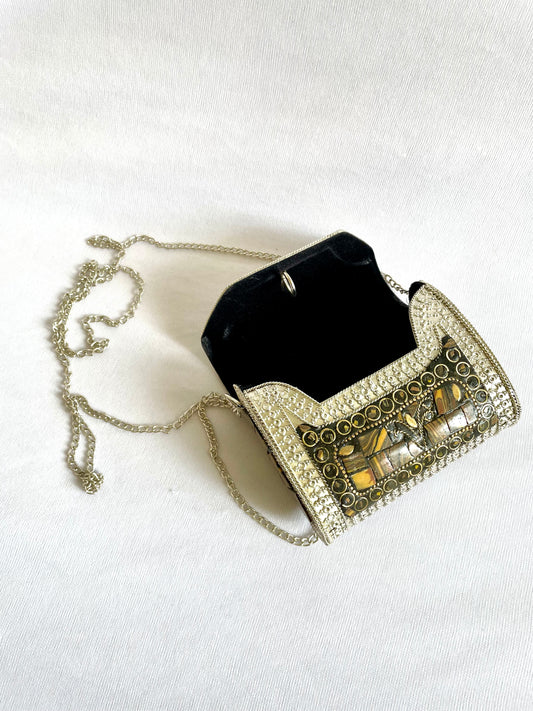 Brown brass sling bag