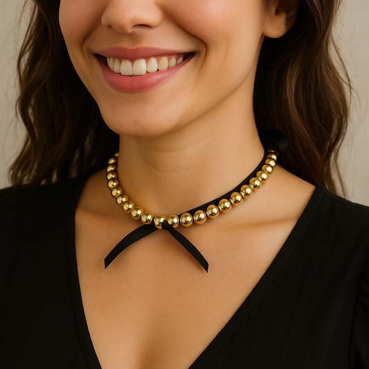 Shop golden pearls bow necklace at Jewellery Lovers. Anti-tarnish, trendy & perfect for daily or festive wear. Free shipping available. jewellerylovers