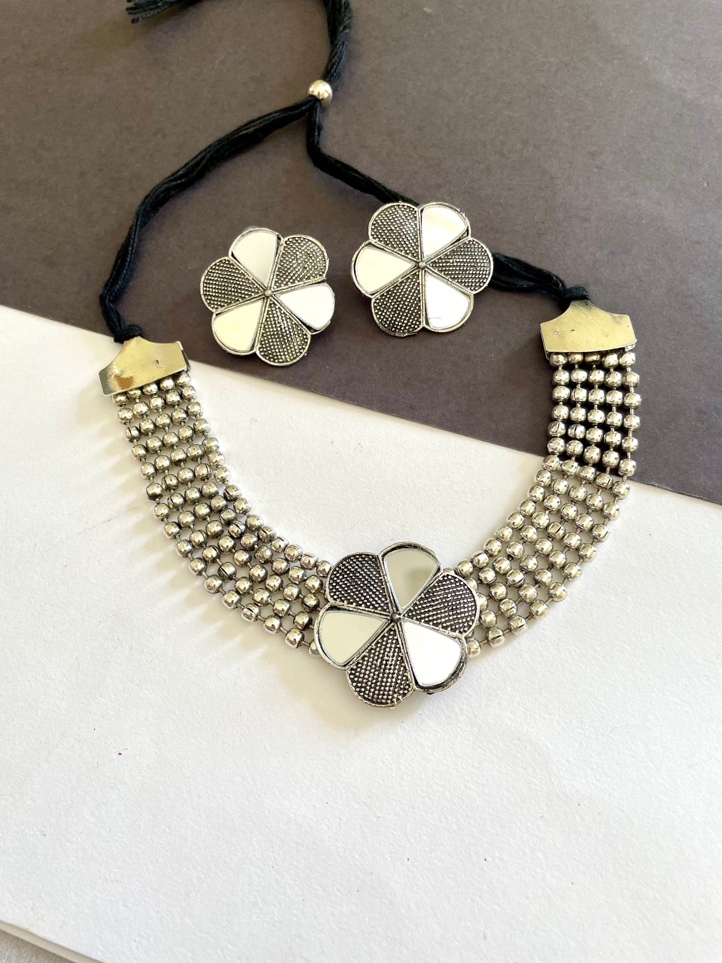 Shop mirror flower choker set with earrings at Jewellery Lovers. Anti-tarnish, trendy & perfect for daily or festive wear. Free shipping available. jewellerylovers