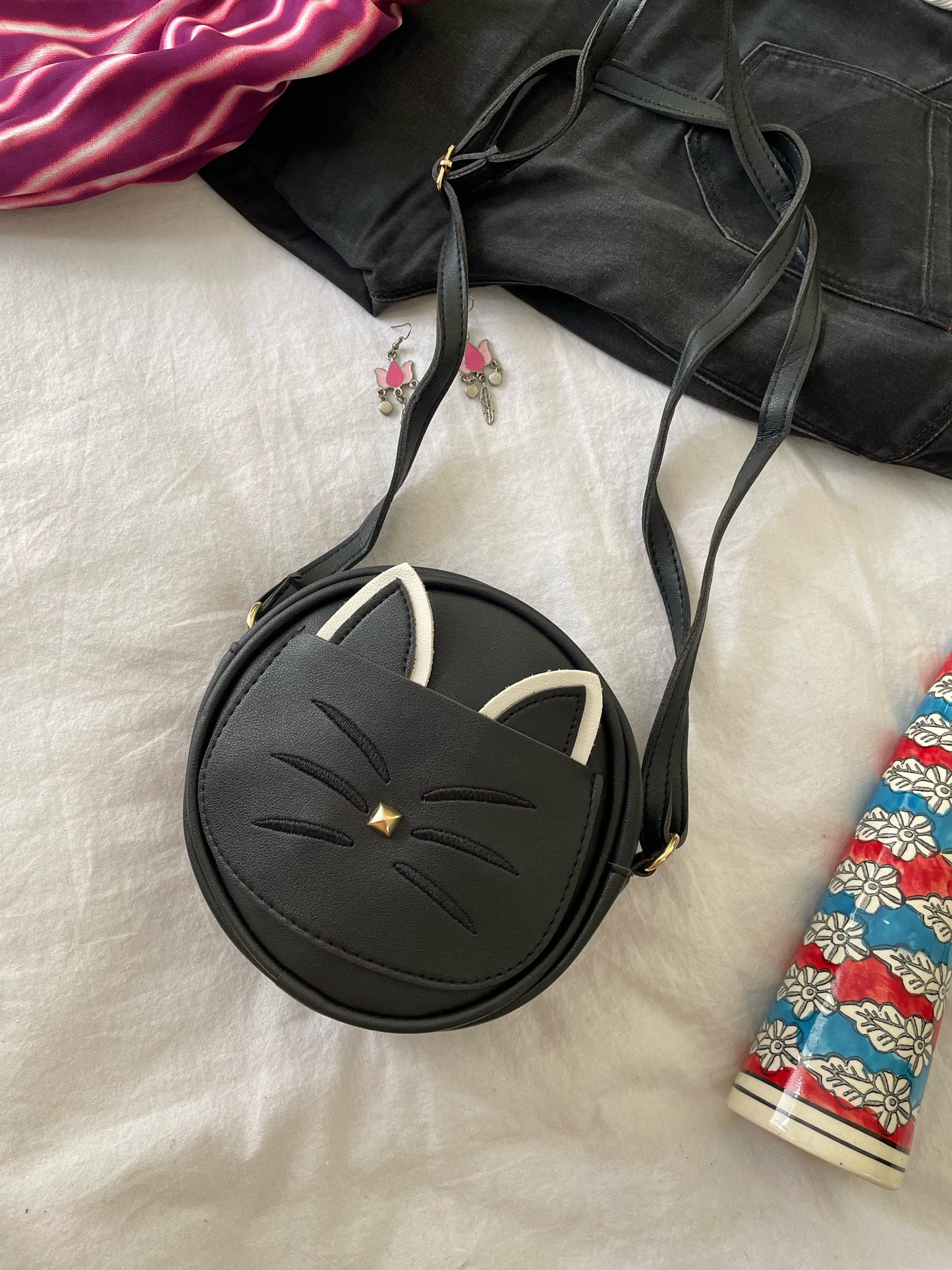 Kitty sling bags