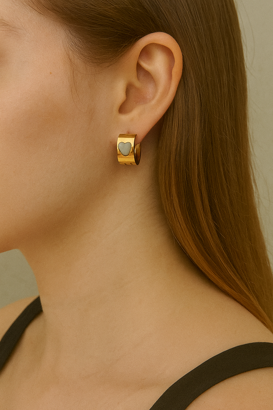 Shop golden heart huggie earrings - cute, minimal & daily wear friendly at Jewellery Lovers. Anti-tarnish, trendy & perfect for daily or festive wear. Free ship jewellerylovers