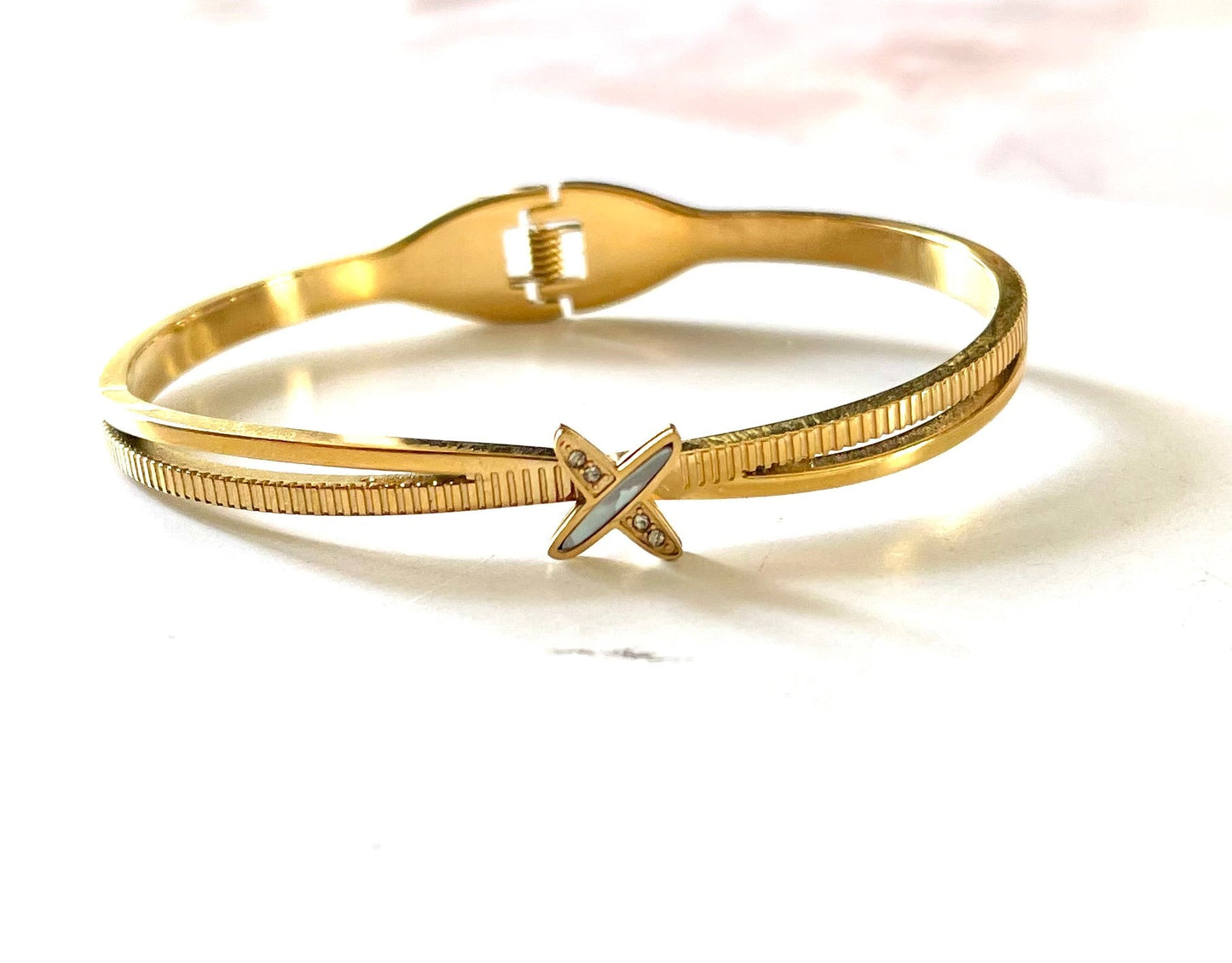 Shop sleek cross bangle at Jewellery Lovers. Anti-tarnish, trendy & perfect for daily or festive wear. Free shipping available. jewellerylovers