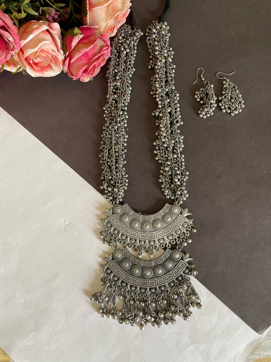 Shop silver double layer long oxidised pendent with earrings at Jewellery Lovers. Anti-tarnish, trendy & perfect for daily or festive wear. Free shipping availa jewellerylovers