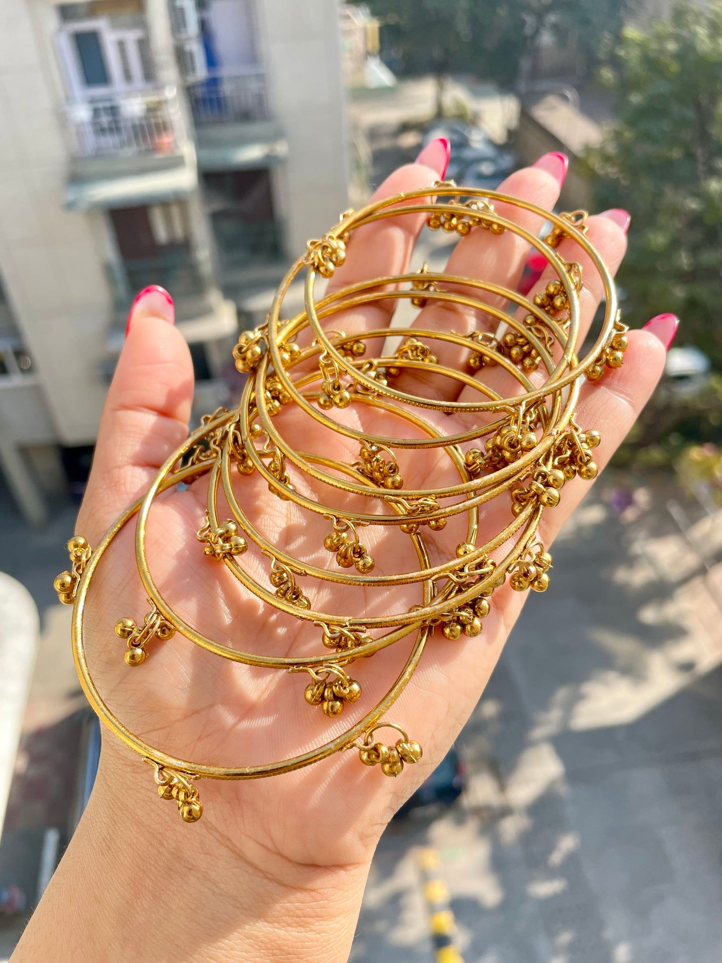 Golden thin ghungroo bangles