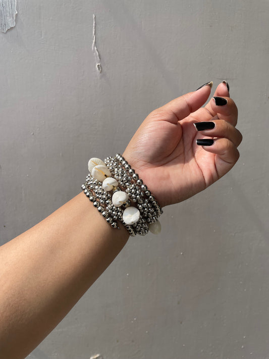 Oxidised shell cuffs