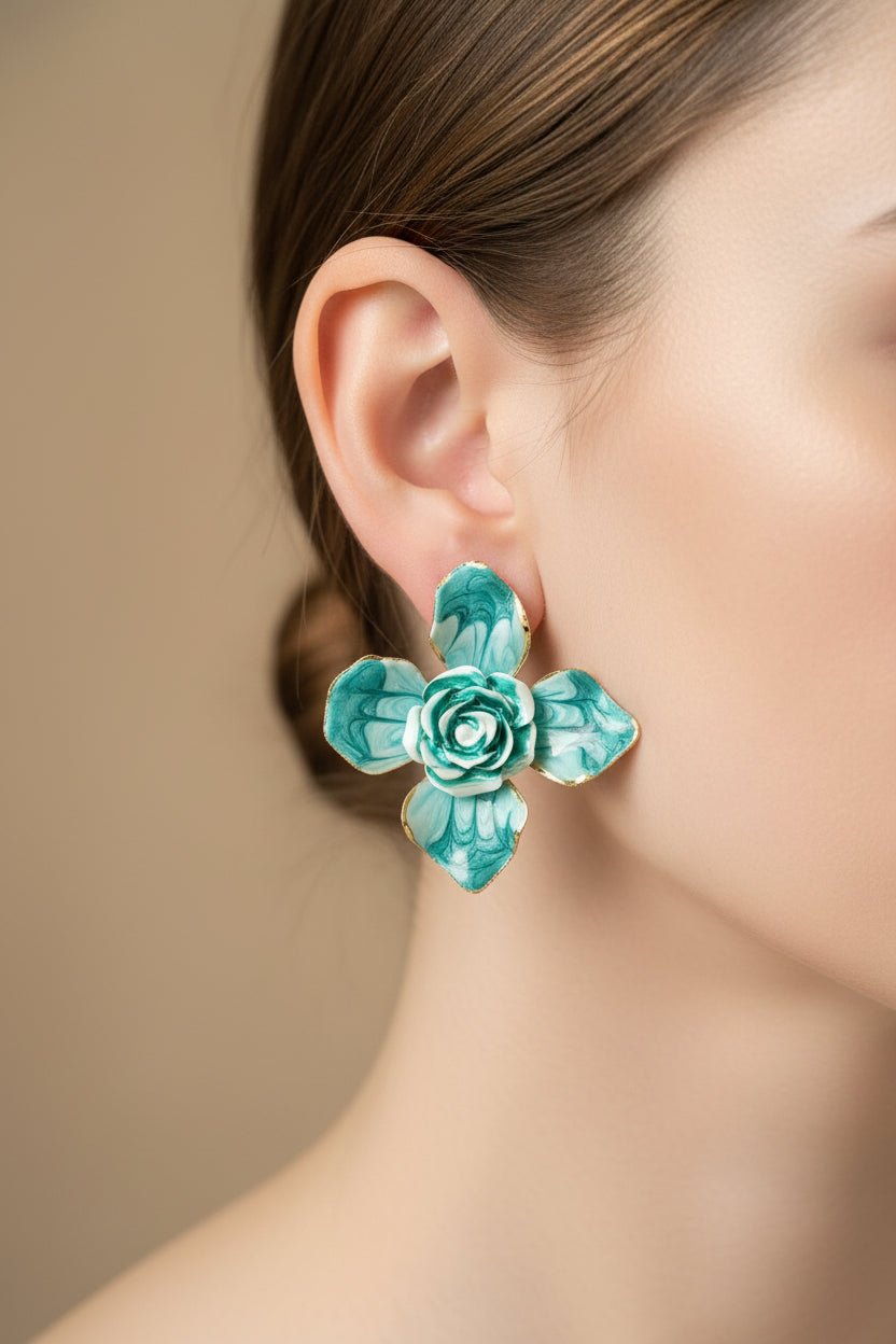 Turquoise flower-shaped earrings on a 'Fashion Jewelry' card against a light background