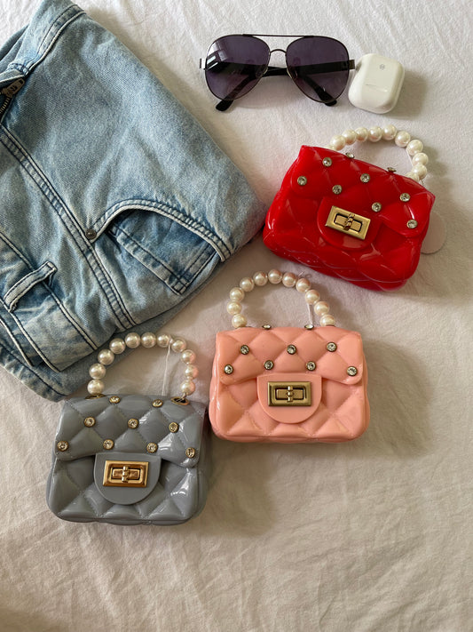 Dotted mini sling bag