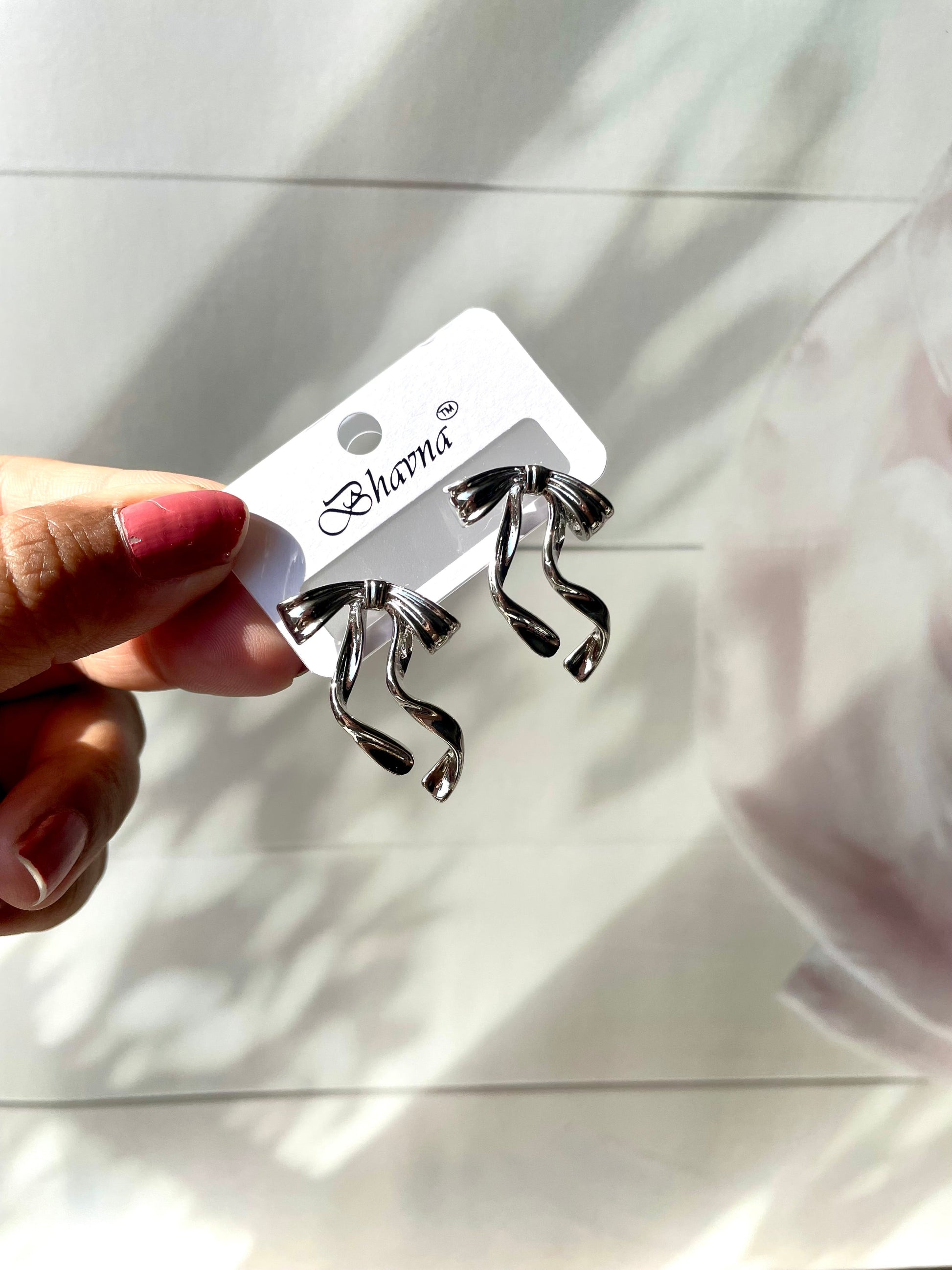 Shop twisted bow earrings at Jewellery Lovers. Anti-tarnish, trendy & perfect for daily or festive wear. Free shipping available. jewellerylovers