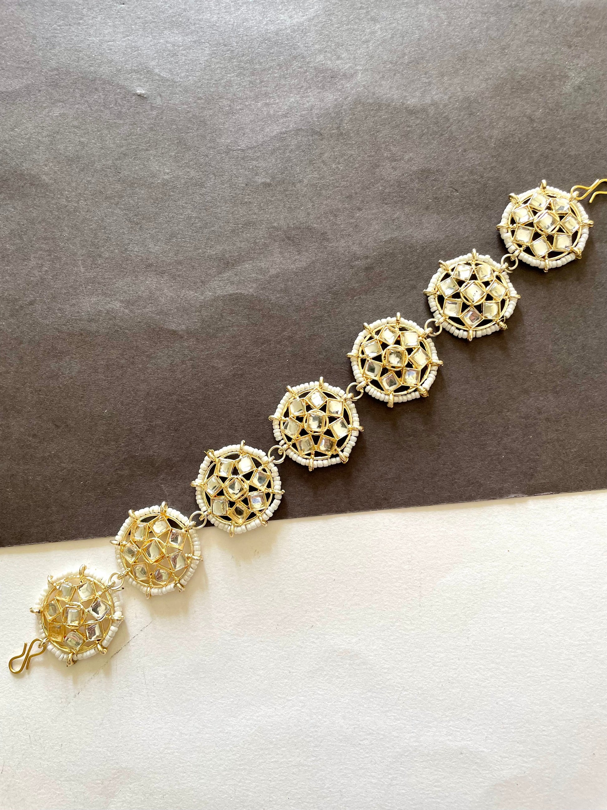 Shop mathapatti flower mirror at Jewellery Lovers. Anti-tarnish, trendy & perfect for daily or festive wear. Free shipping available. jewellerylovers
