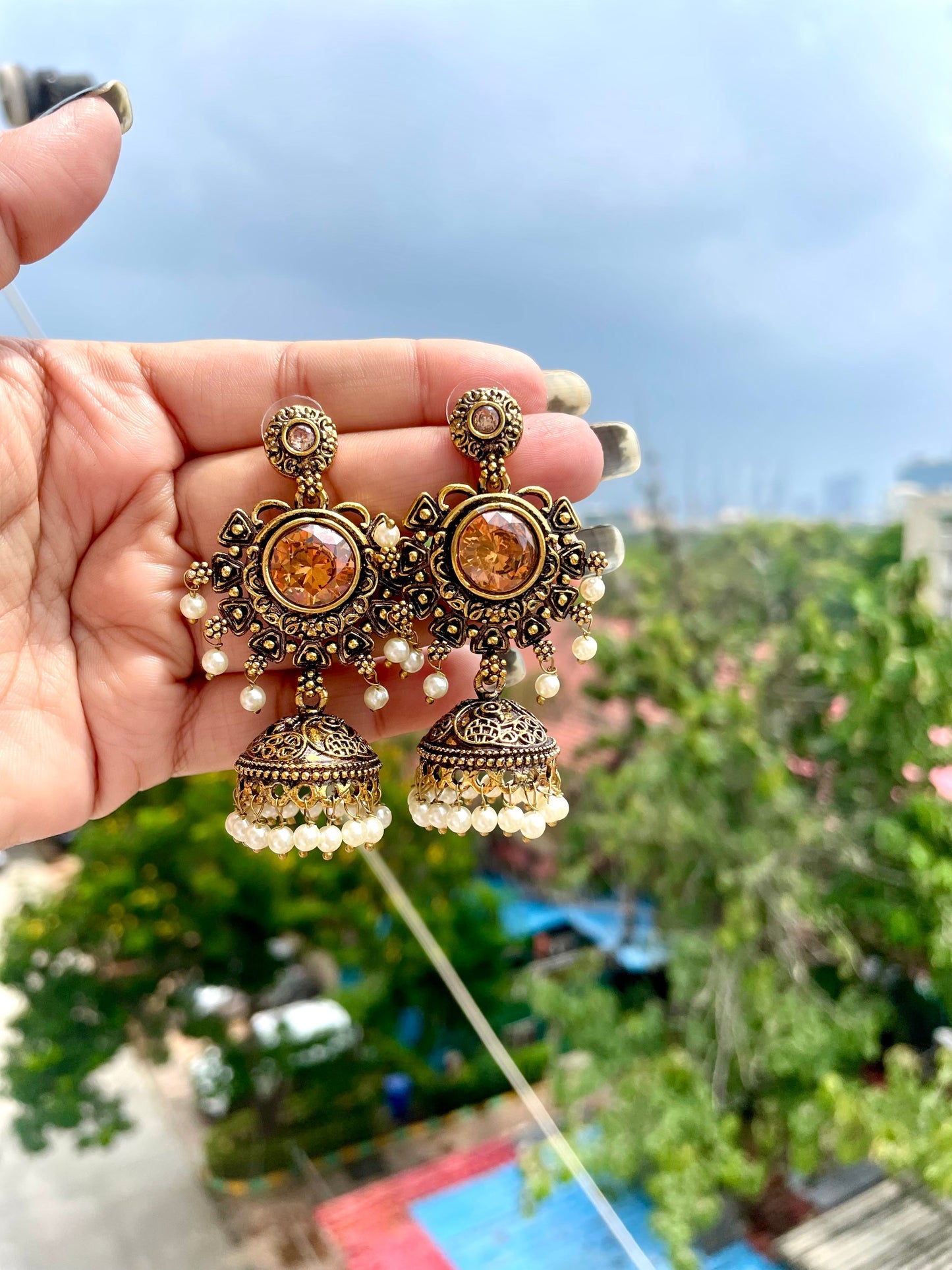 Round golden jhumka jewellerylovers