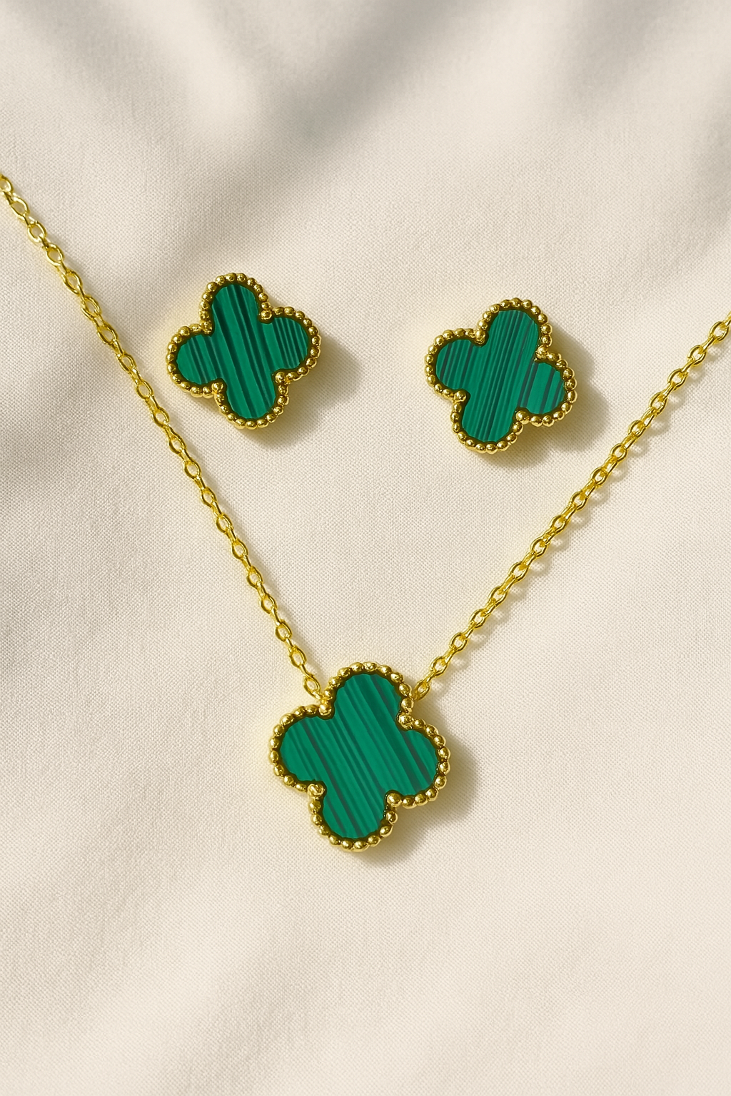 Shop clover charm necklace & earrings set - available in 4 stunning colors at Jewellery Lovers. Anti-tarnish, trendy & perfect for daily or festive wear. Free s jewellerylovers