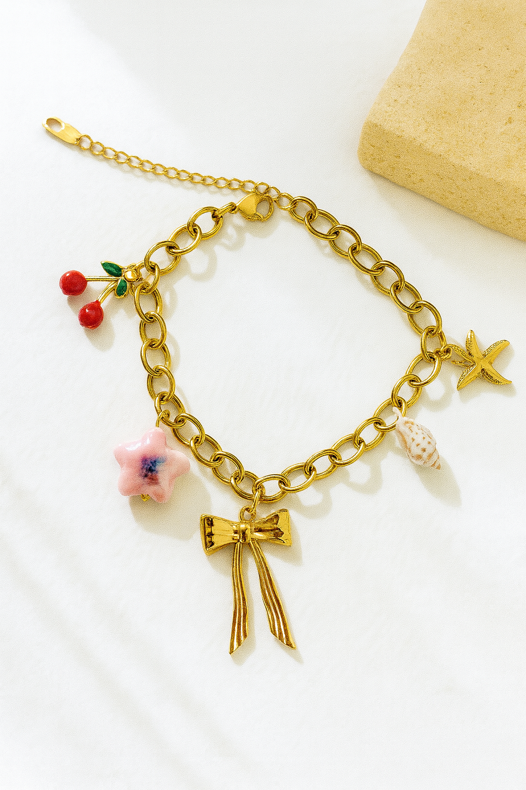 Bow charm bracelet jewellerylovers