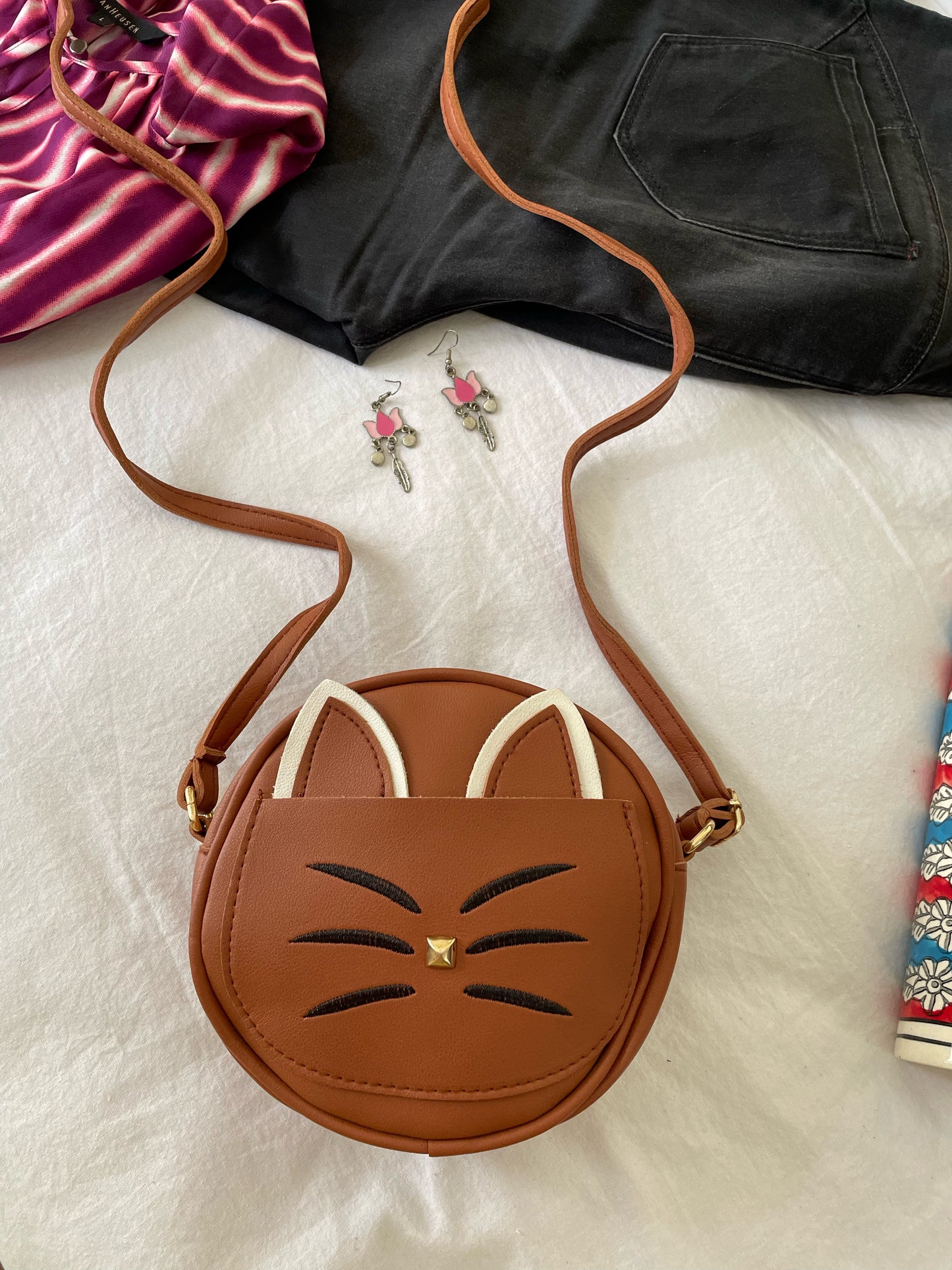 Kitty sling bags