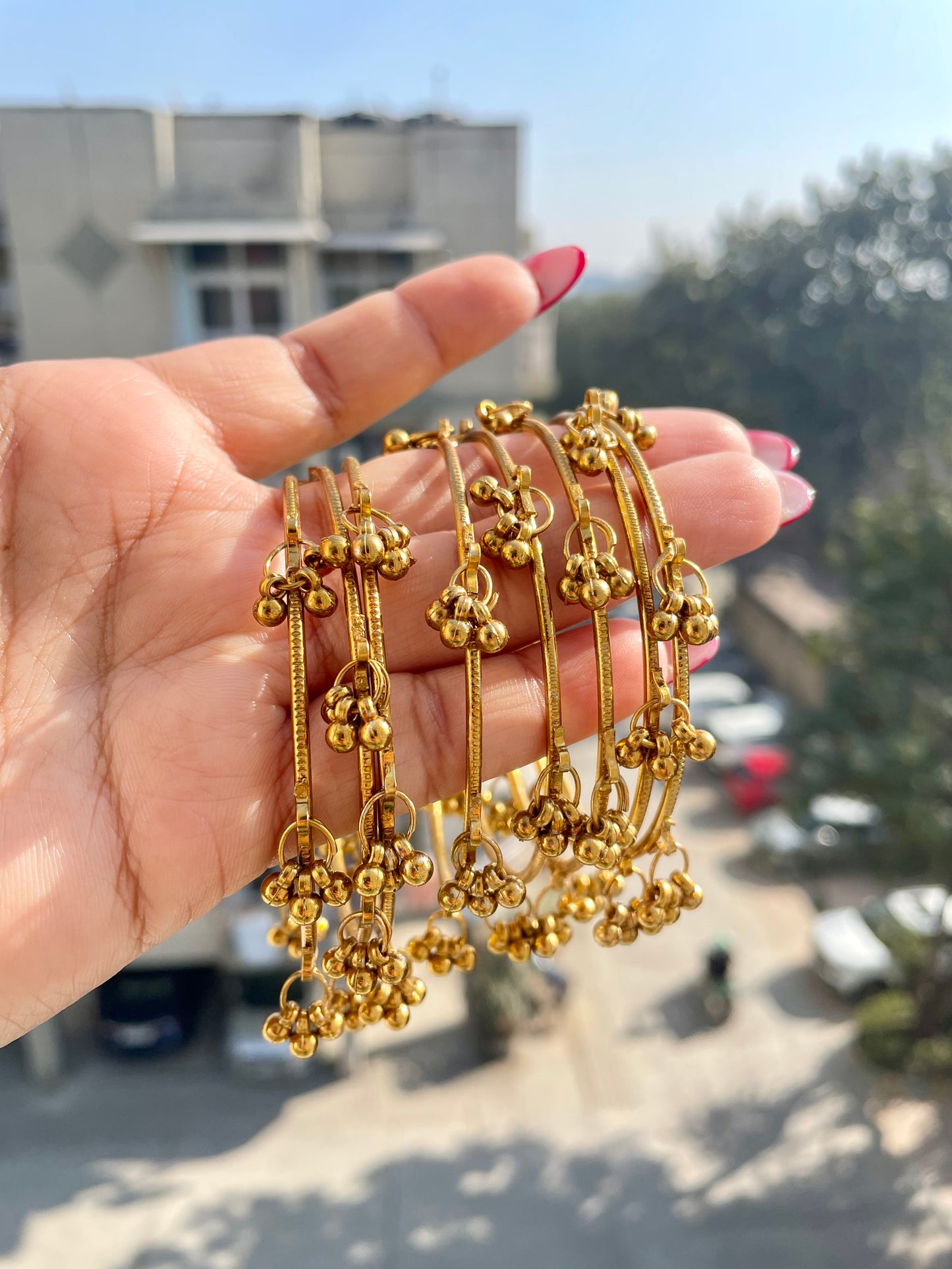 Golden thin ghungroo bangles